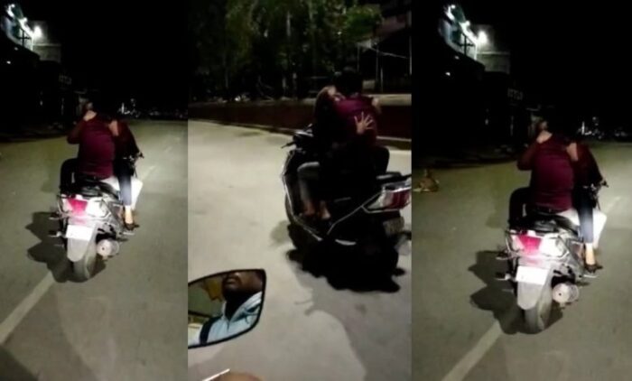 VIRAL VIDEO: Couple's romance on a moving scooty, girl sitting on boy's lap doing KISS, see viral VIDEO