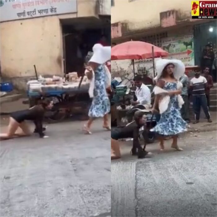  VIDEO : कुत्ते की तरह पट्टा बांधकर लड़की को रोड पर घुमाती दिखी महिला 