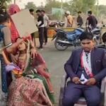 VIDEO : शादी में बवाल, दबंगों ने बारातियों को पीटा, दूल्हे पर फेंकी धूल-मिट्टी, अब पुलिस चौकी के सामने धरने पर बैठे दूल्हा-दुल्हन